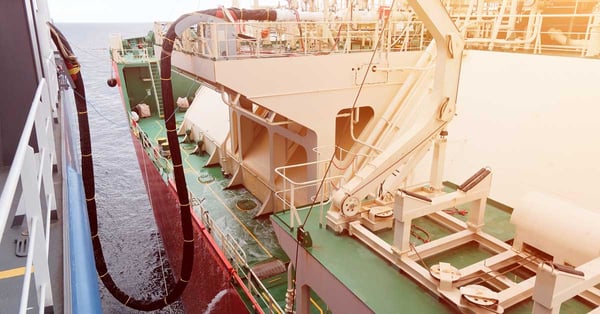 A ship at port bio-bunkering renewable fuel.https://www.resourcewise.com/blog/low-carbon-ammonia-takes-major-step-toward-marine-adoption