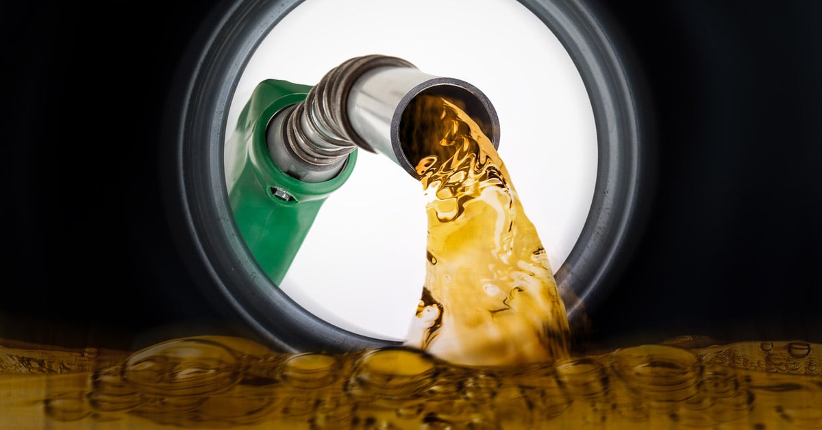 A diesel pump filling fuel into a container.