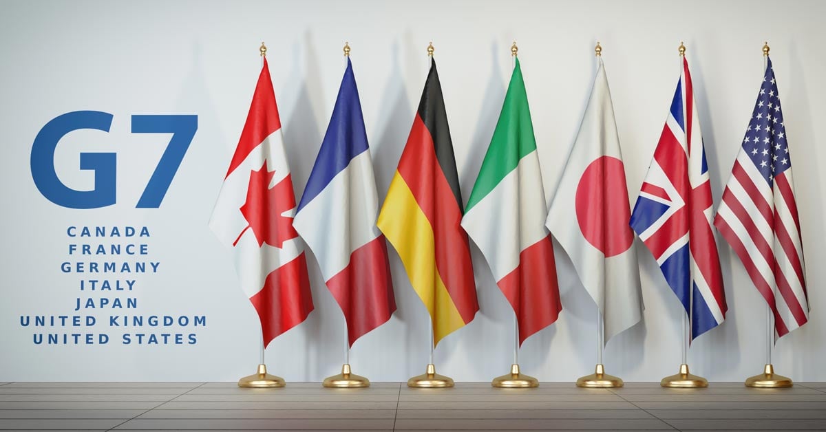 The 7 flags of the G7 countries, listing all of the countries on the left side of the image.