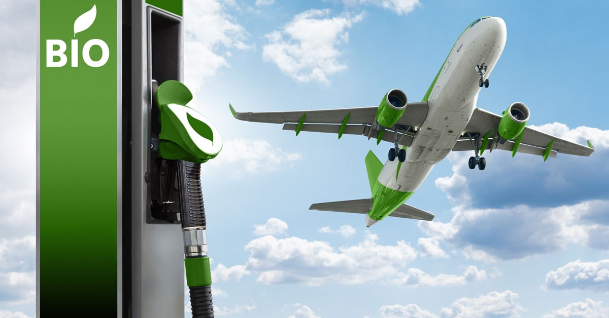 An airplane in the sky flying with SAF with a biofuel pump in the foreground.