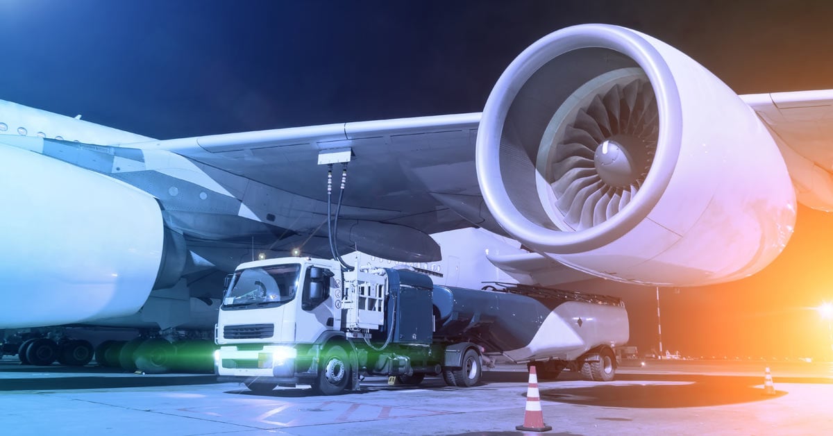 A commercial airplane being fueled by eSAF, or synthetic aviation fuel.