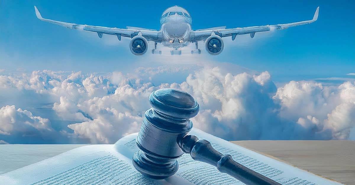 An airplane flying in the sky with an open law book and gavel.