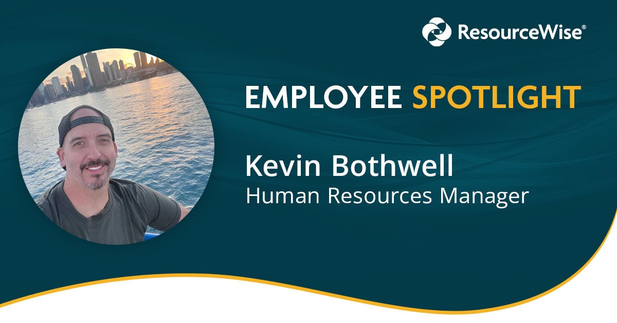ResourceWise employee Kevin Bothwell headshot on the lake in front of the Chicago skyline. 