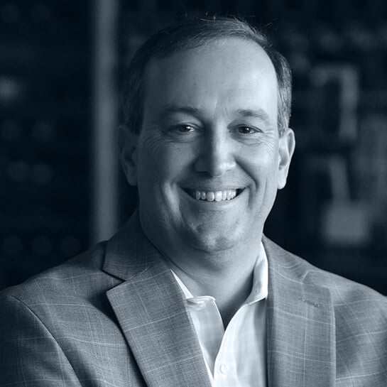 A black and white headshot of Trip Jobe, VP Sales, Forest Value Chain