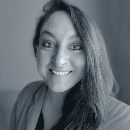 Codi Eremita headshot in black and white.