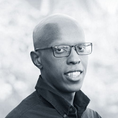 Headshot of Marcus Hunter in black and white. 