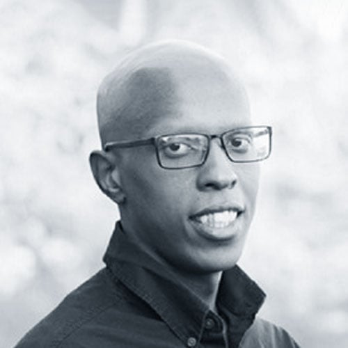 Headshot of Marcus Hunter in black and white.