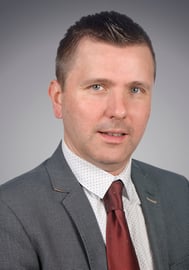 A headshot of Tecnon OrbiChem consutlant Jaroslaw Clenkosz.