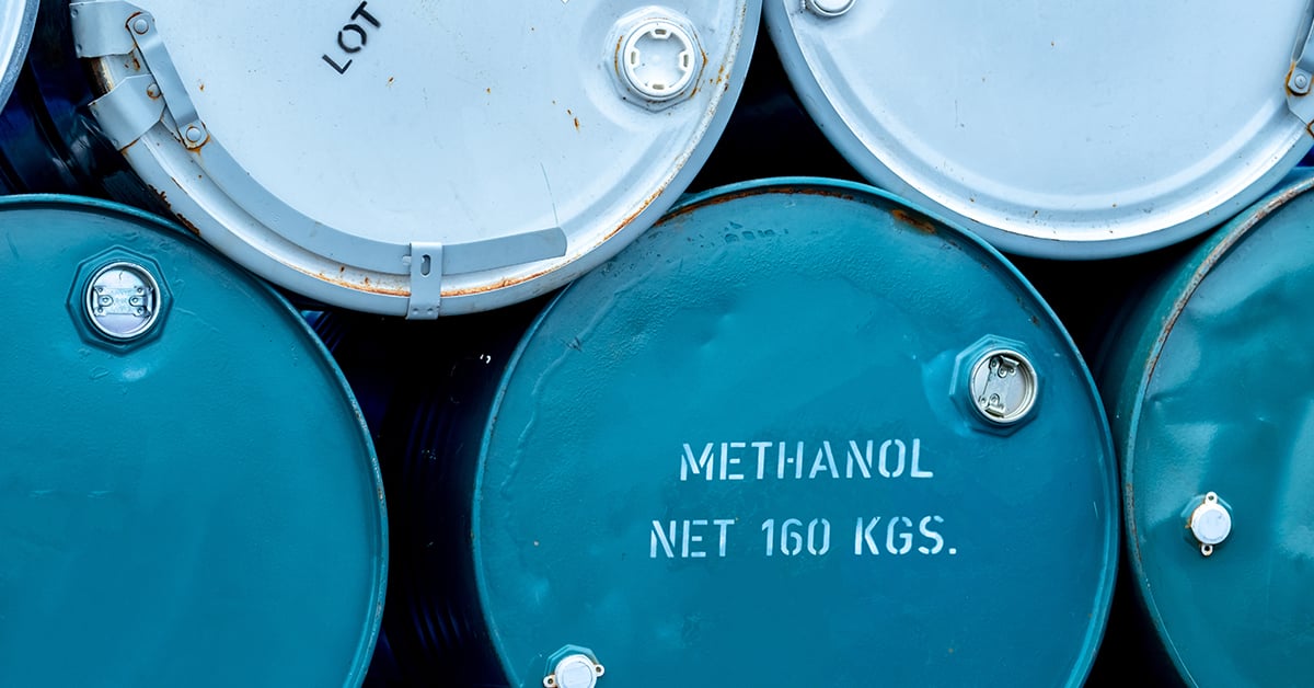 blue methanol barrels stacked on each other