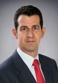 A head and shoulders business photograph of ResourceWise business manager Javier Rivera covers PET and polyester markets globally.