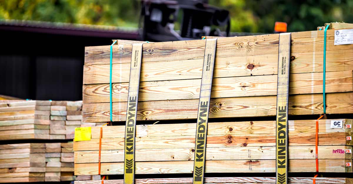 Lumber stacked onto pallets ready for transport to sale.
