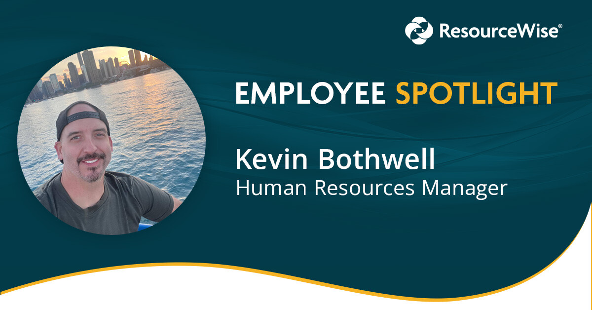 ResourceWise employee Kevin Bothwell headshot on the lake in front of the Chicago skyline. 